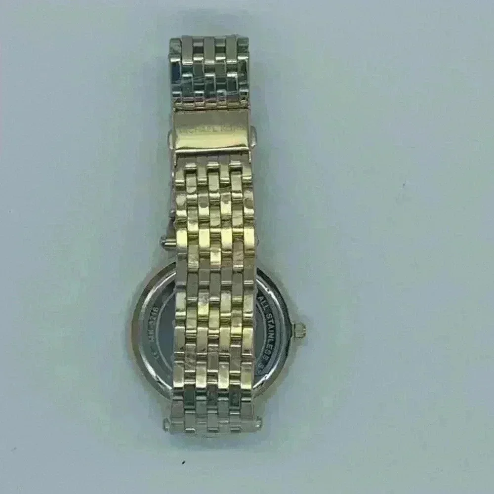 NEW! Michael Kors Gold Watch. Never worn.